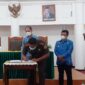Penandatanganan MOU Pengamanan Aset Daerah oleh Bupati TTU Drs. Djuandi David dan Kajari TTU Roberth J. Lambila, SH.MH (Foto: Yuven Abi/Savanaparadise.com)