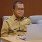 Gubernur NTT, Melki Laka Lena saat menjadi Keynote speech via online dari Ruang Kerja Gubernur NTT pada kegiatan Seminar Nasional (Foto: YH)