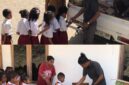 Ketua Ikatan Keluarga Ende Lio Sare Kutai Timur-Kaltim, Quirinus Parwono Rasi membagikan Susu Kotak dan Makanan Ringan kwpada Siswa Siswi TK dan SD (Foto: Mateus Bheri/SP)